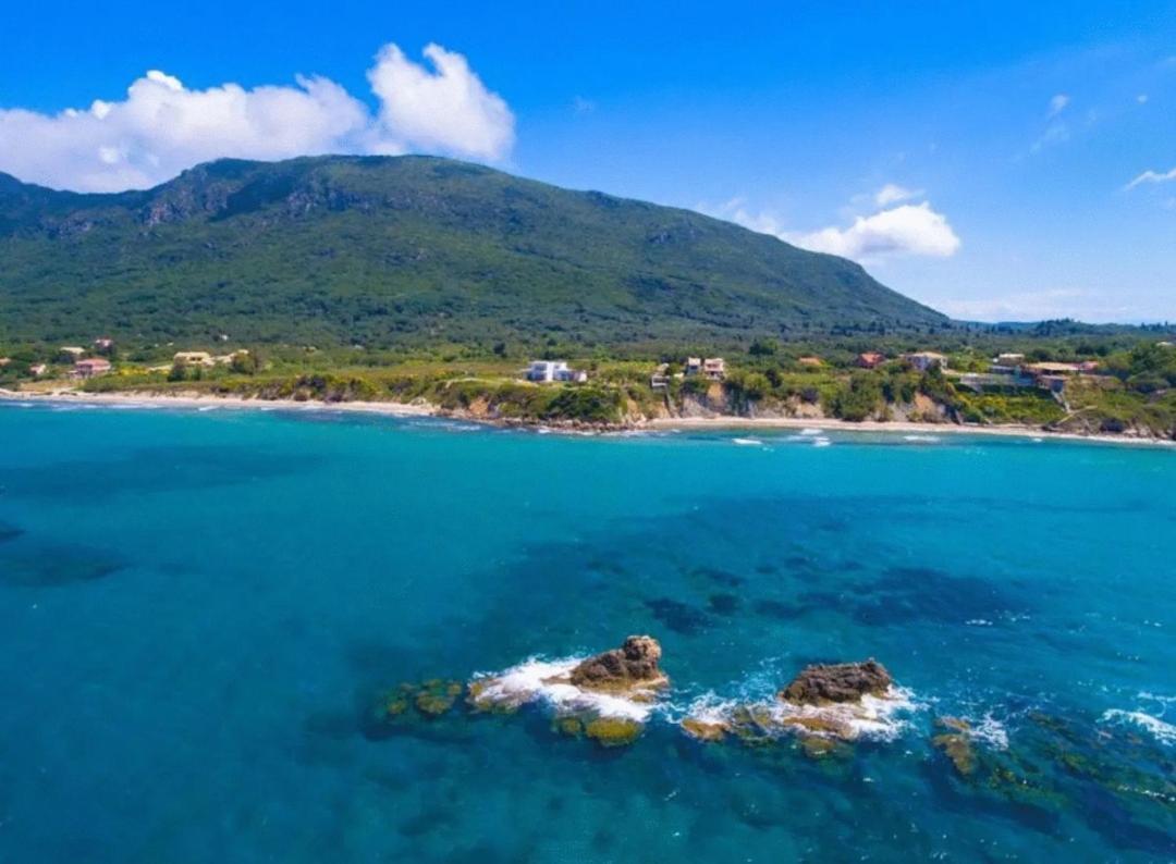 Tetraktys Estate Beachside Υδωρ Ágios Matthaíos Dış mekan fotoğraf